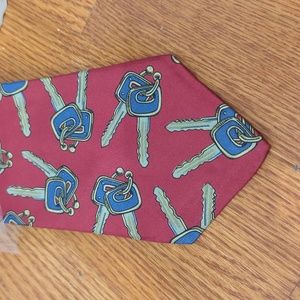 Retro keys on keyring tie new in packaging. Red, gold, & blue